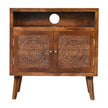 Front view of the Tova mango wood cabinet with patterned door fronts and brass knobs