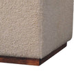 Detail of the boucle fabric and mango wood table on the Arden Bench Duo