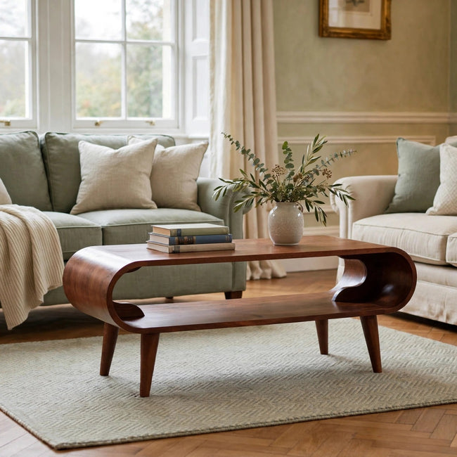 Amaya Nordic style solid mango wood coffee table in a chestnut finish, shown in a living room