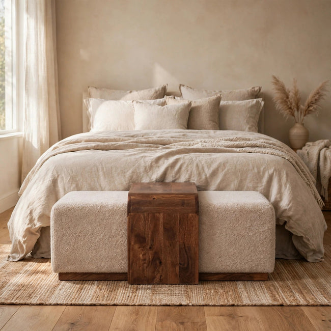 Arden Bench Duo with two boucle seats and a solid mango wood table in a room setting