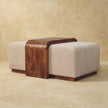 Front view of the Arden Bench Duo with a boucle seat on each side of the wood table