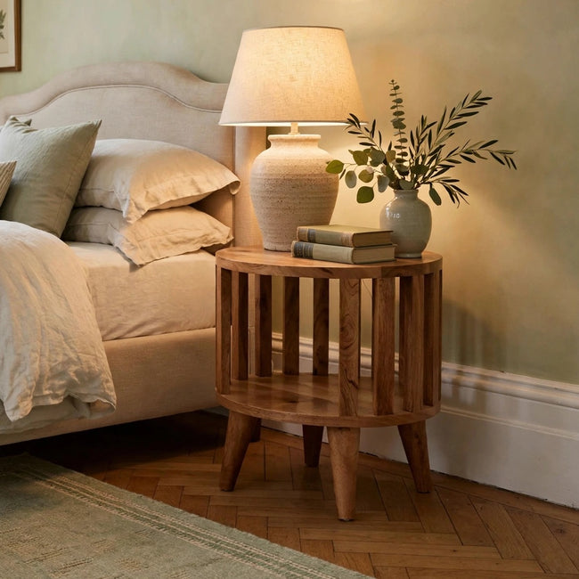 Ariella single shelf bedside table in solid mango wood styled in a bedroom