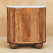 Side view of the Aurora bedside table showing its rounded ball feet