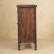 Bamboo carved chest of drawers styled as a bedroom or hallway piece