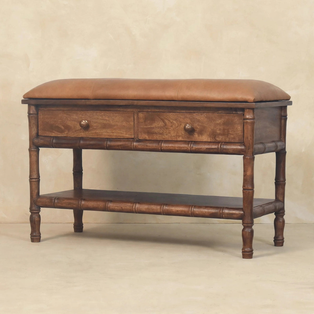 Storage bench with two drawers and antique brass knobs in a room setting