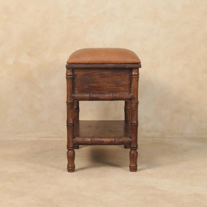 Bamboo carved storage bench placed in an entryway-style room