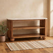 Marble shoe bench with a solid mango wood base in a styled hallway