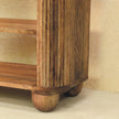 Side angle of the marble shoe bench showing the Golden Teak wood finish