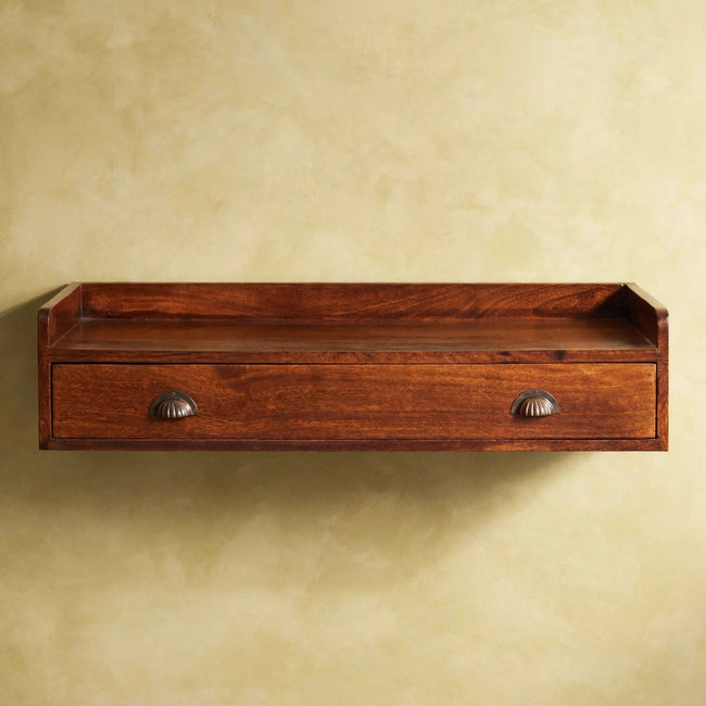 Front view of the Belmont console shelf with its single drawer and two shell brass handles