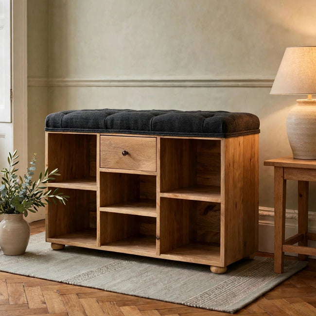 Black tweed shoe storage bench with 1 drawer in a hallway setting