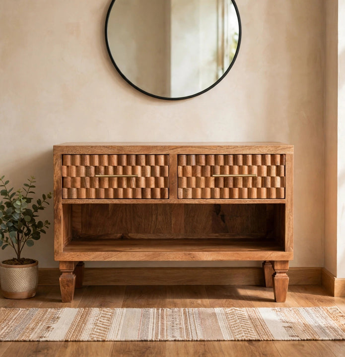 Solid mango wood entryway shoe cabinet with carved drawer fronts in a hallway