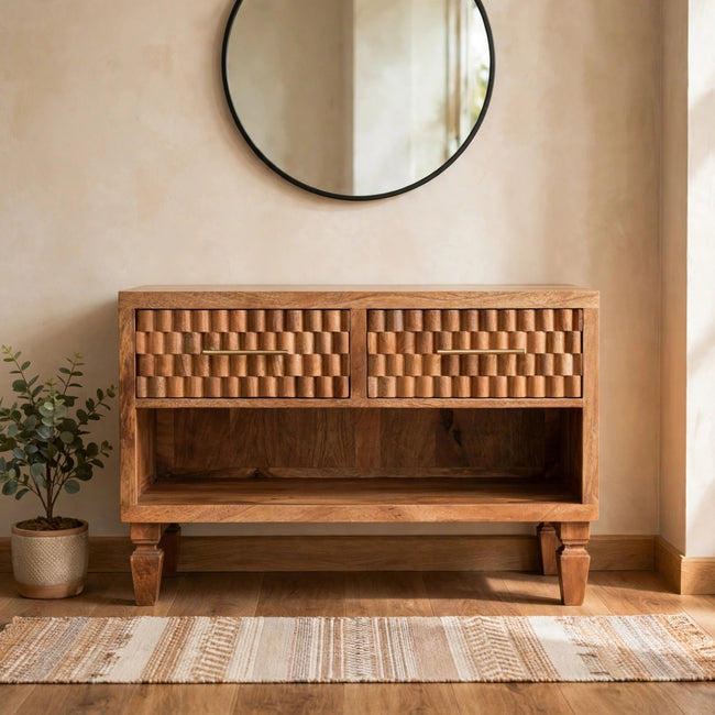 Solid mango wood entryway shoe cabinet with carved drawer fronts in a hallway