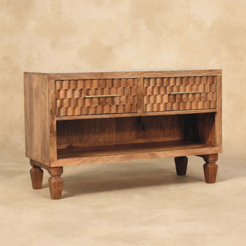 Shoe cabinet with an open lower shelf and upper drawers in a home interior