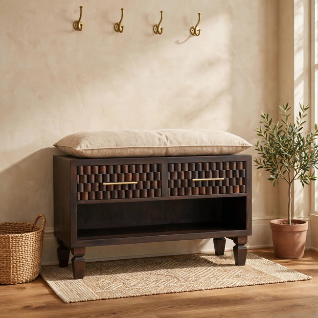 Solid mango wood shoe storage bench with carved drawer fronts in a hallway setting