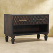 Shoe storage bench with shoes stored in the open lower compartment