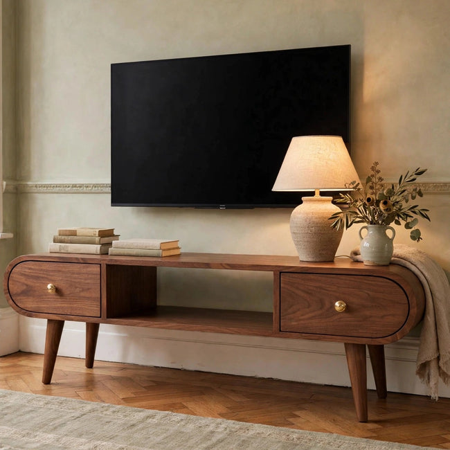 California walnut circular TV unit in solid mango wood, shown in a living room setting