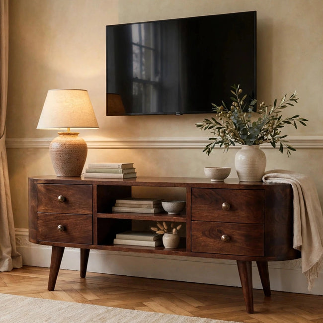 California walnut entertainment unit with rounded edges and four drawers in a living room