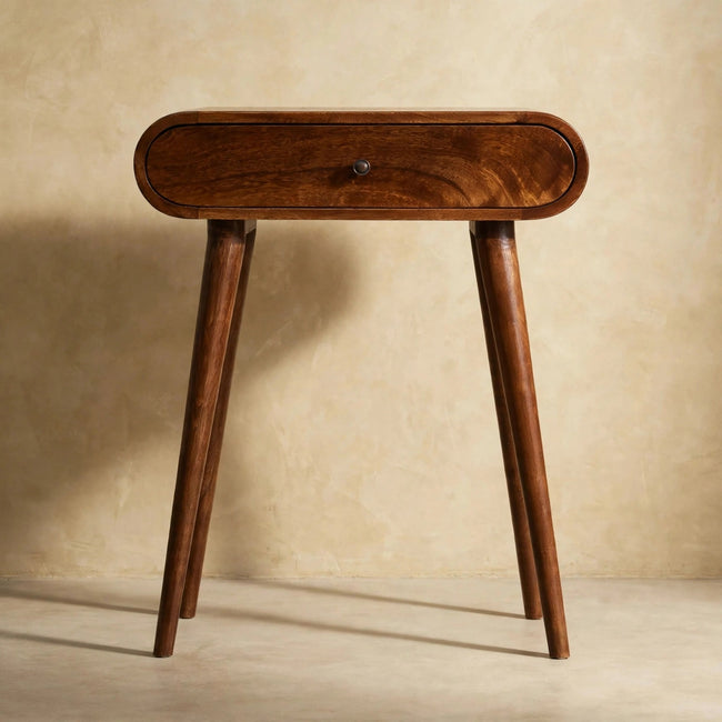 Chestnut-finish console table with shiny drawer knobs and Nordic-style legs in a hallway setting