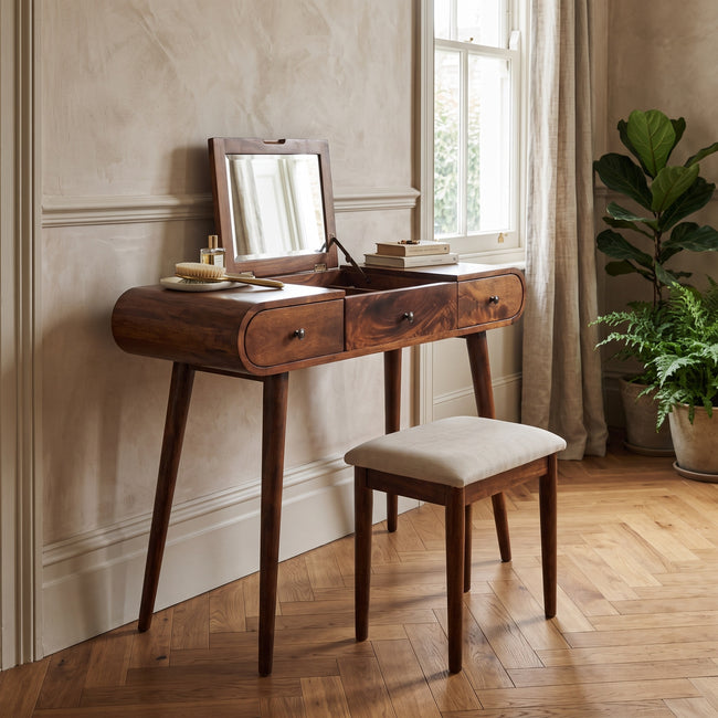 Chestnut mirror dressing table in solid mango wood, shown in a bedroom setting