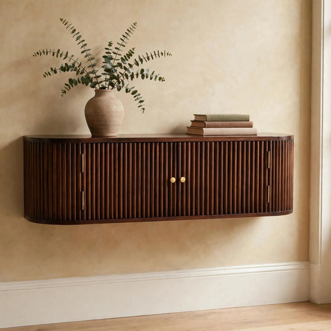 Chunky chestnut wall mounted console table in solid mango wood, shown in a room