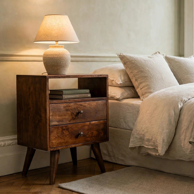 Classic Chestnut solid mango wood bedside table with brass knobs in a bedroom
