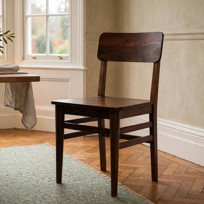 Classic Chestnut mango wood dining chair in a dining room setting