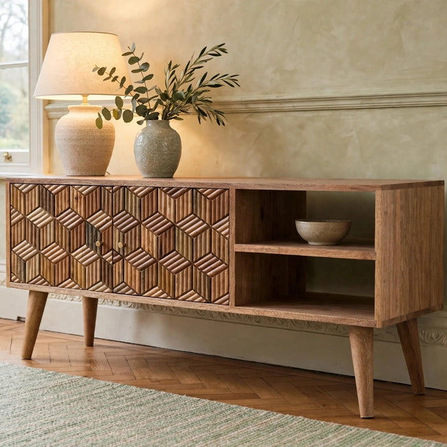 Cubana solid mango wood media unit with an oak-ish finish styled in a living room