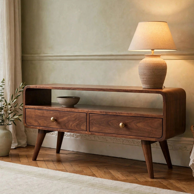Curved California walnut media unit in solid mango wood styled in a living room