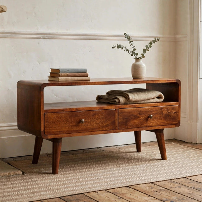 Curved chestnut mango wood media unit in a living room setting