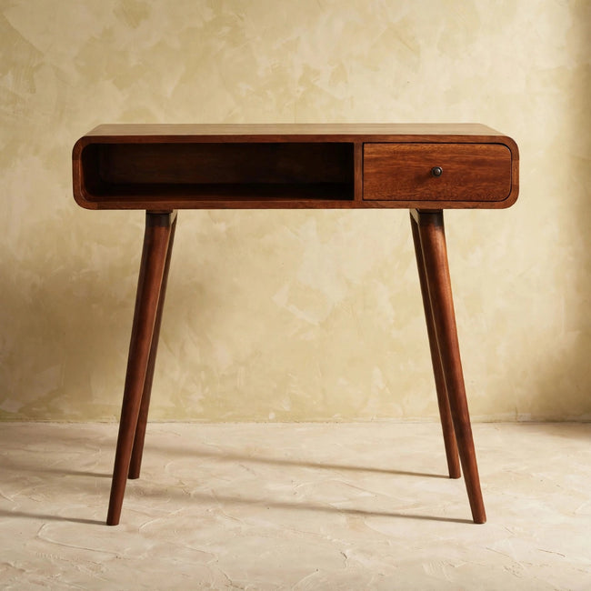 Writing desk with chestnut finish and Nordic-style legs in a room setting