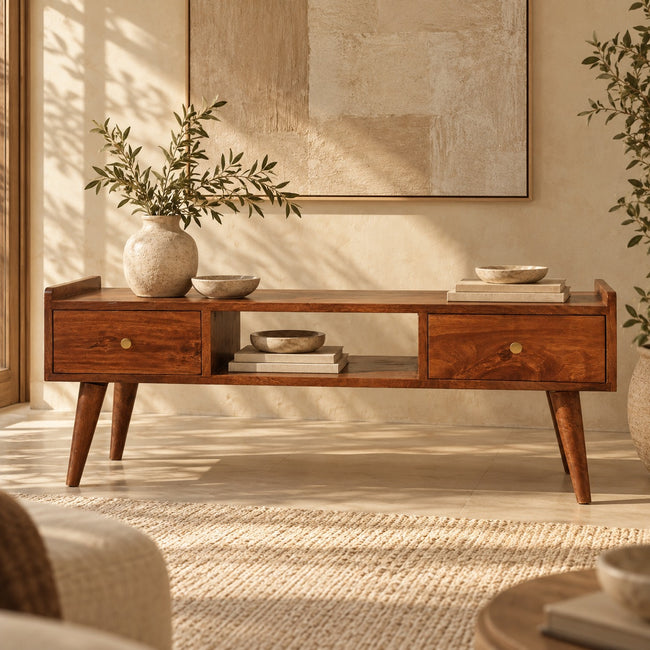 Chestnut solid mango wood media unit with raised edges and Nordic-style legs in a living room