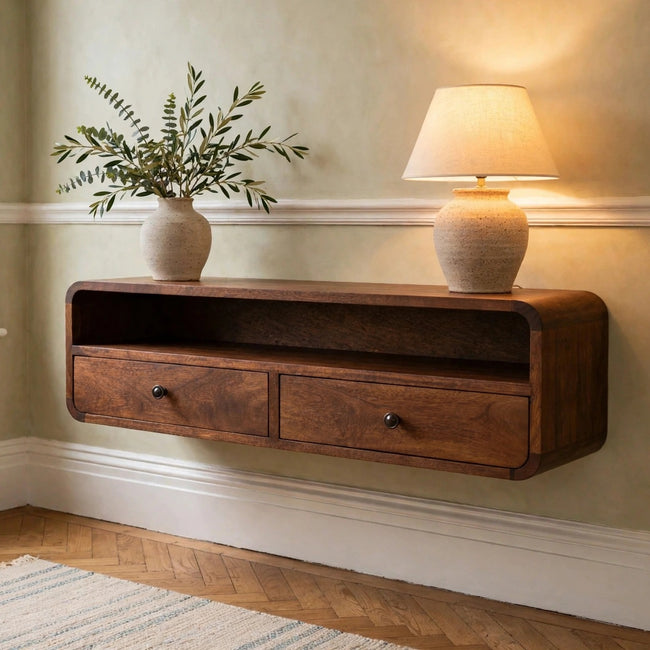 Floating chestnut mango wood console table mounted on a hallway wall