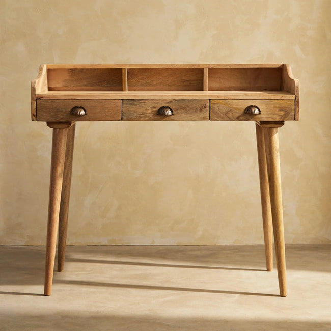 Gallery Back Shell Writing Desk with oak-like finish and Scandinavian-style legs in a study