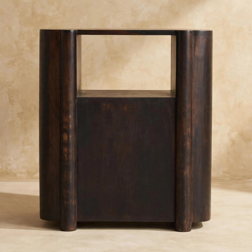 Havana nightstand with books on the open shelf in a bedroom