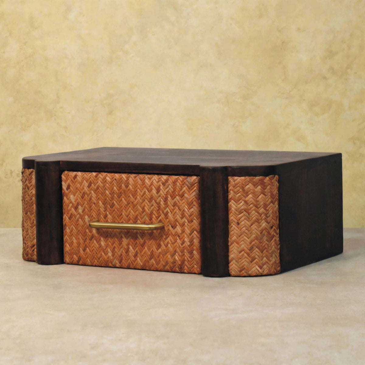 Velvet Mocha bedside table with a woven-effect drawer front in a styled bedroom