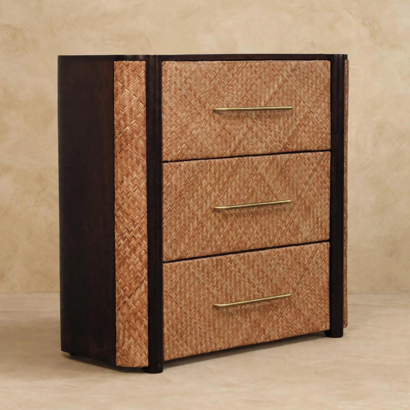 Mocha-finished mango wood chest of three drawers with brass handles in a styled room