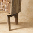 Close-up of the woven rattan door front on the Knit Door Bedside