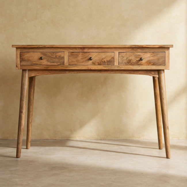 Large 3 drawer console table in solid mango wood styled in a hallway