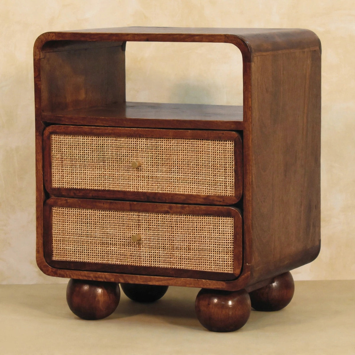 Larissa nightstand in a bedroom, showing the open shelf and two drawers