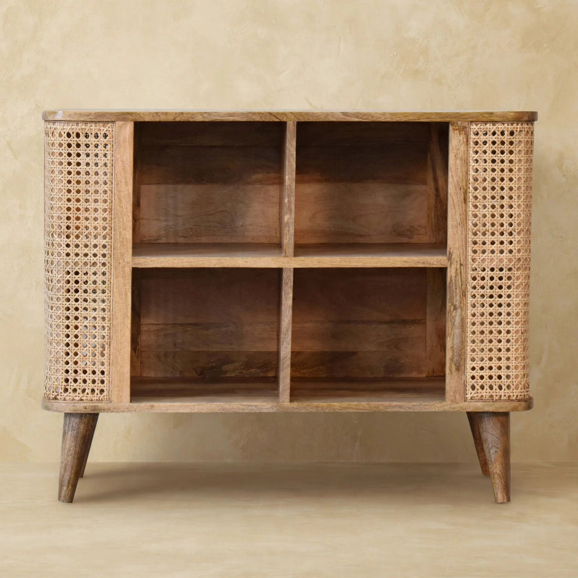 Larissa open cabinet with rattan design and small shelves in a room setting