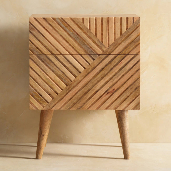 Front view of the Lille bedside table showing the hand carved line design on its two drawer fronts