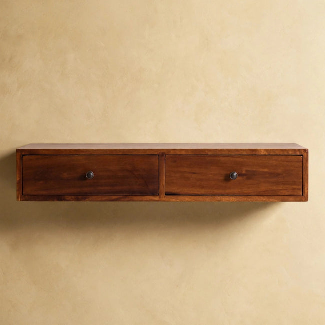 Floating chestnut mango wood console with two drawers and knobs, mounted on a wall