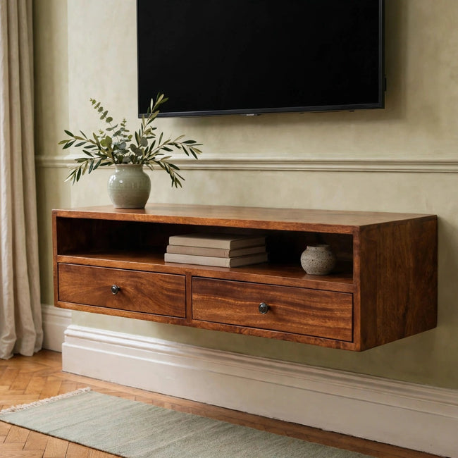 Lunar 2 drawer chestnut wall mounted media unit in solid mango wood, mounted in a living room