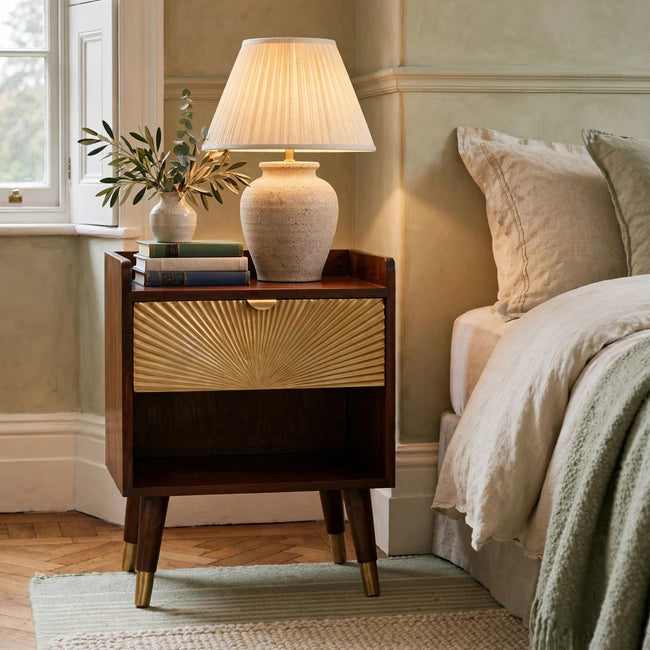 Manila Gold one drawer bedside table in chestnut mango wood styled in a bedroom