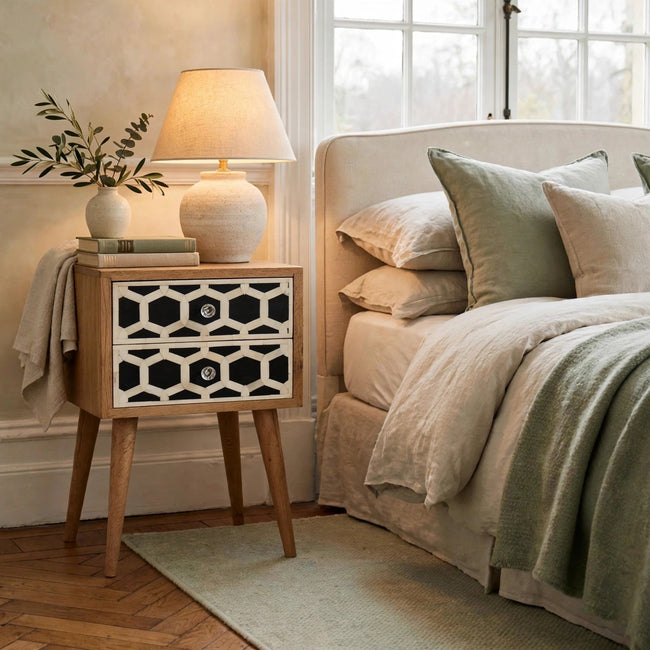 Mini bone inlay 2 drawer bedside table in solid mango wood, shown in a bedroom