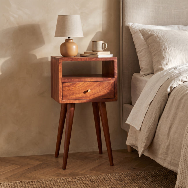 Mini Cherry Bedside Table in solid mango wood with a cherry finish, shown in a bedroom