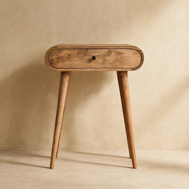 Front view of the Mini London console table showing drawers with shiny knobs
