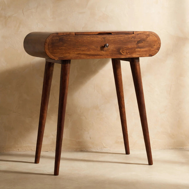 Round mango wood vanity with Nordic-style legs and foldable mirror in a room setting