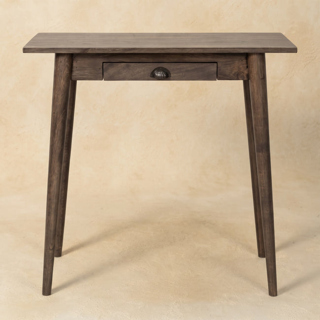Classic Grey writing desk with slim tapered legs styled in a home interior