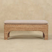 Rattan bench with solid mango wood frame placed in a home interior